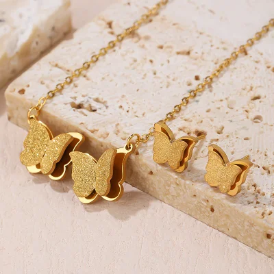 Doppeltes Schmetterlings-Design-Edelstahl-Ohrring-Halsketten-Schmuckset für Frauen